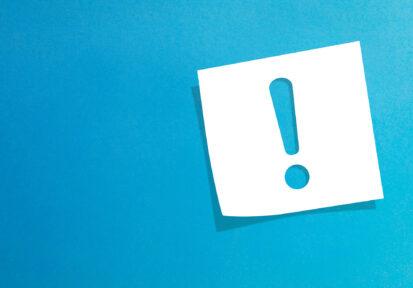 Exclamation mark on post-it note