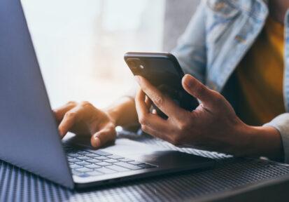 work using texting cell phone typing computer.chatting on mobile