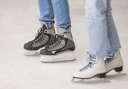 two people skating on ice