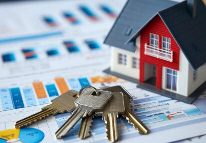 Homeownership Financial Planning with House Model and Keys